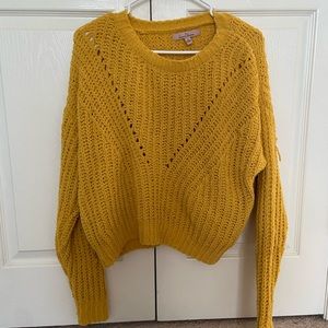 golden yellow sweater